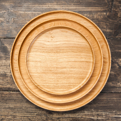 Wooden plates, bowls and trays
