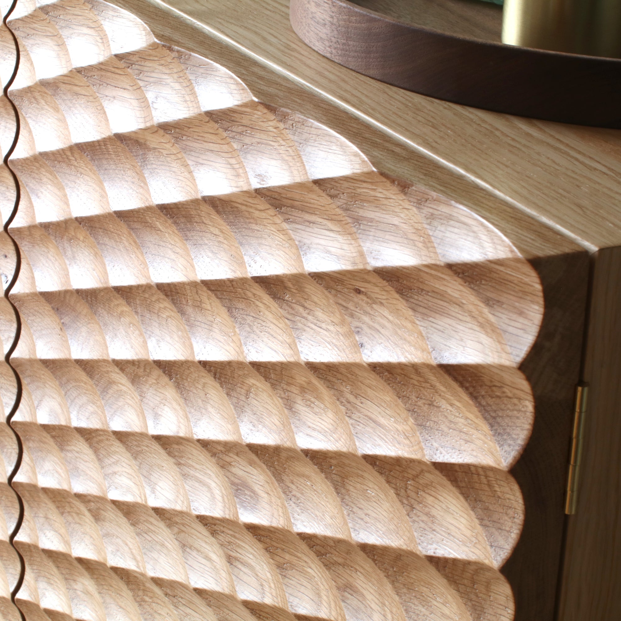 Sideboard with sculpted doors