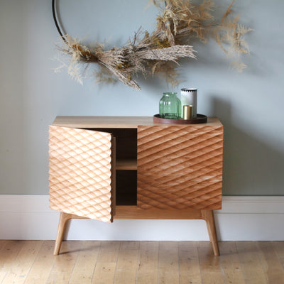 Sideboard with sculpted doors