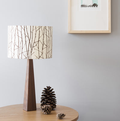 Solid walnut table lamp base and fabric woodland print shade